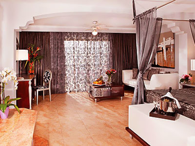 Dominikana - hotel Majestic Elegance Punta Cana, pokój Elegance Club One Bedroom Suite z Jacuzzi, tropical sun