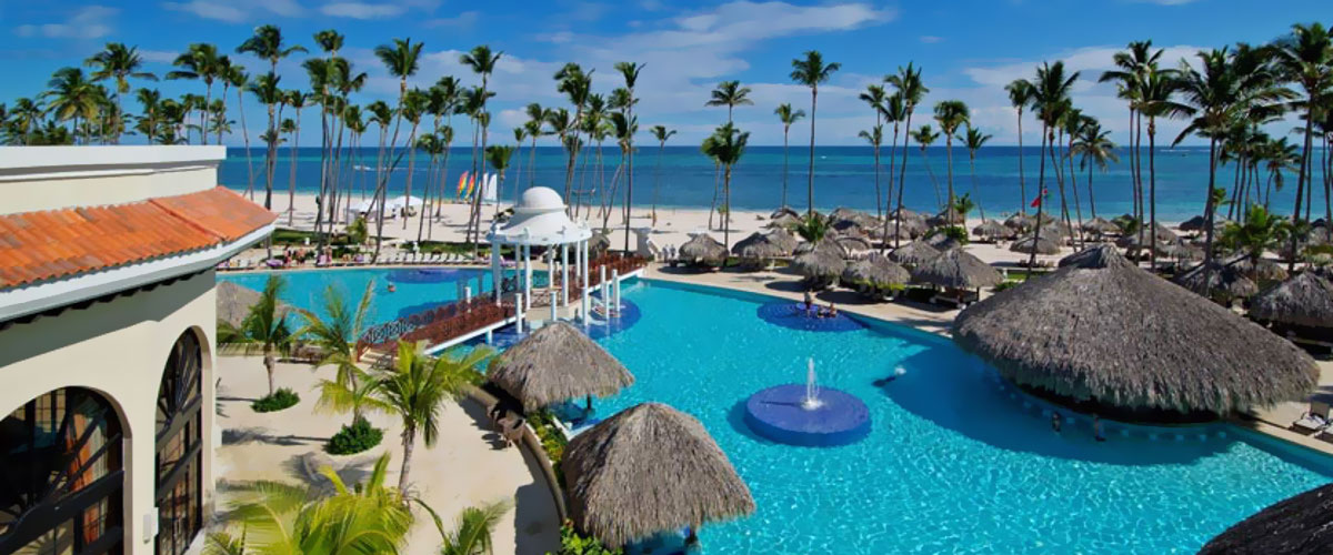 Dominikana - hotel The Reserve at Paradisus Palma Real, basen, bar, tropical sun