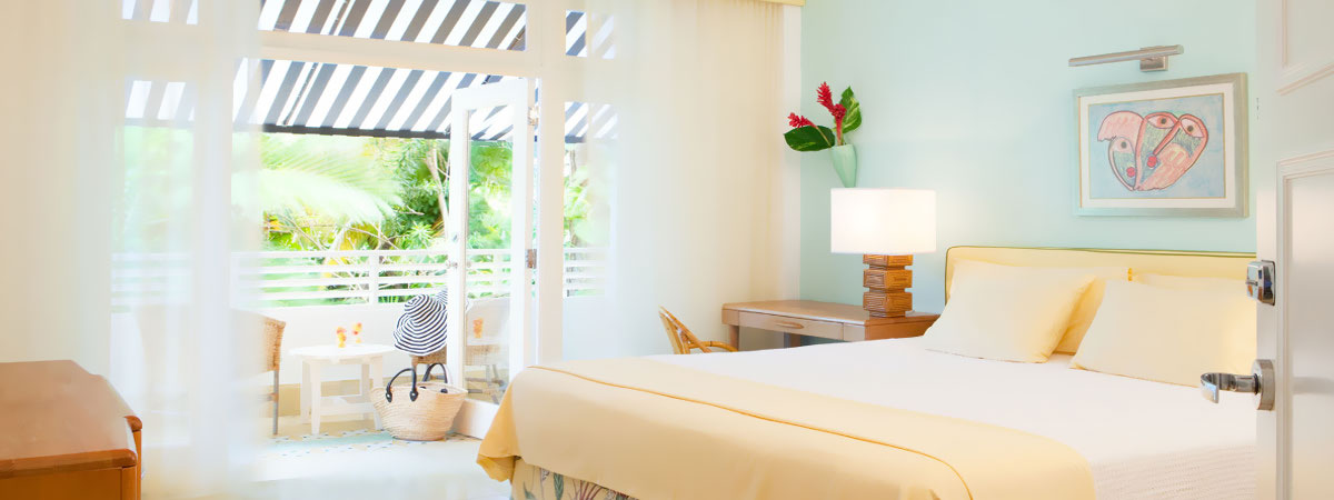 Jamajka - hotel Couples Tower Isle, pokój, sypialnia, tropical sun