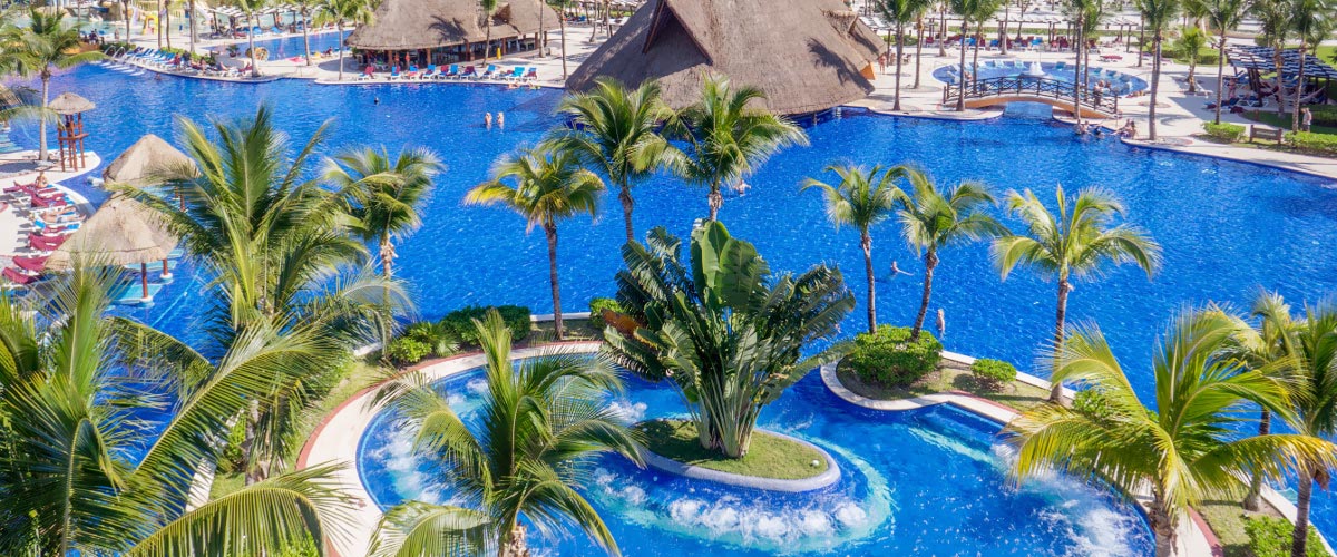 Meksyk - hotel Barcelo Maya Palace Deluxe, baseny, palmy, Morze Karaibskie, tropical sun
