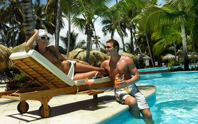Grand Palladium Palace, Dominikana, Punta Cana, para na leżaku przy basenie, Tropical Sun Tours